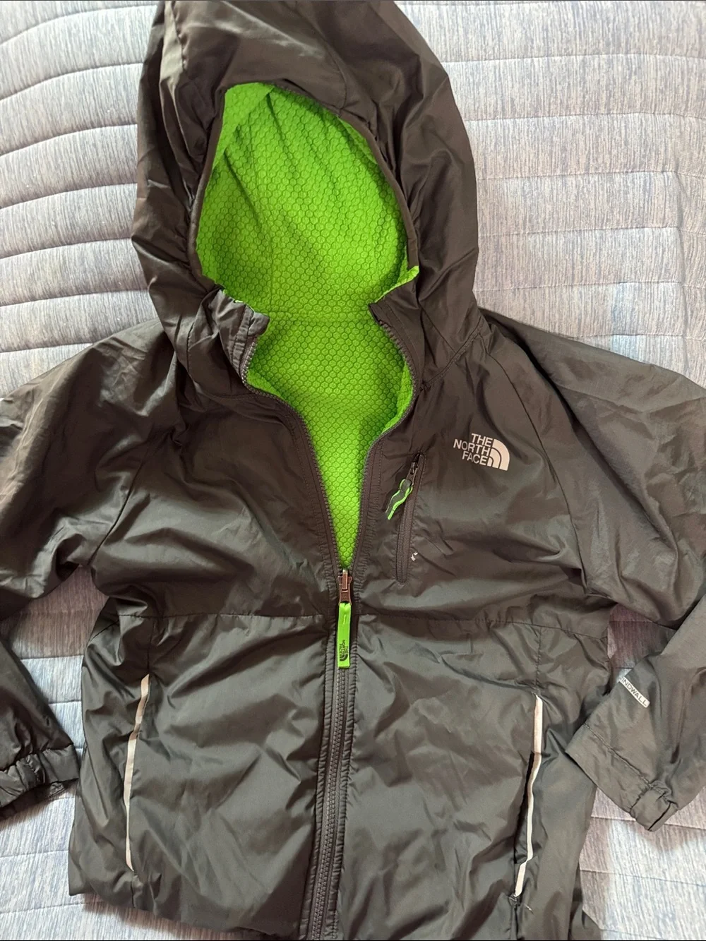 The North Face Kids Black Raincoat with Lime Green Lining